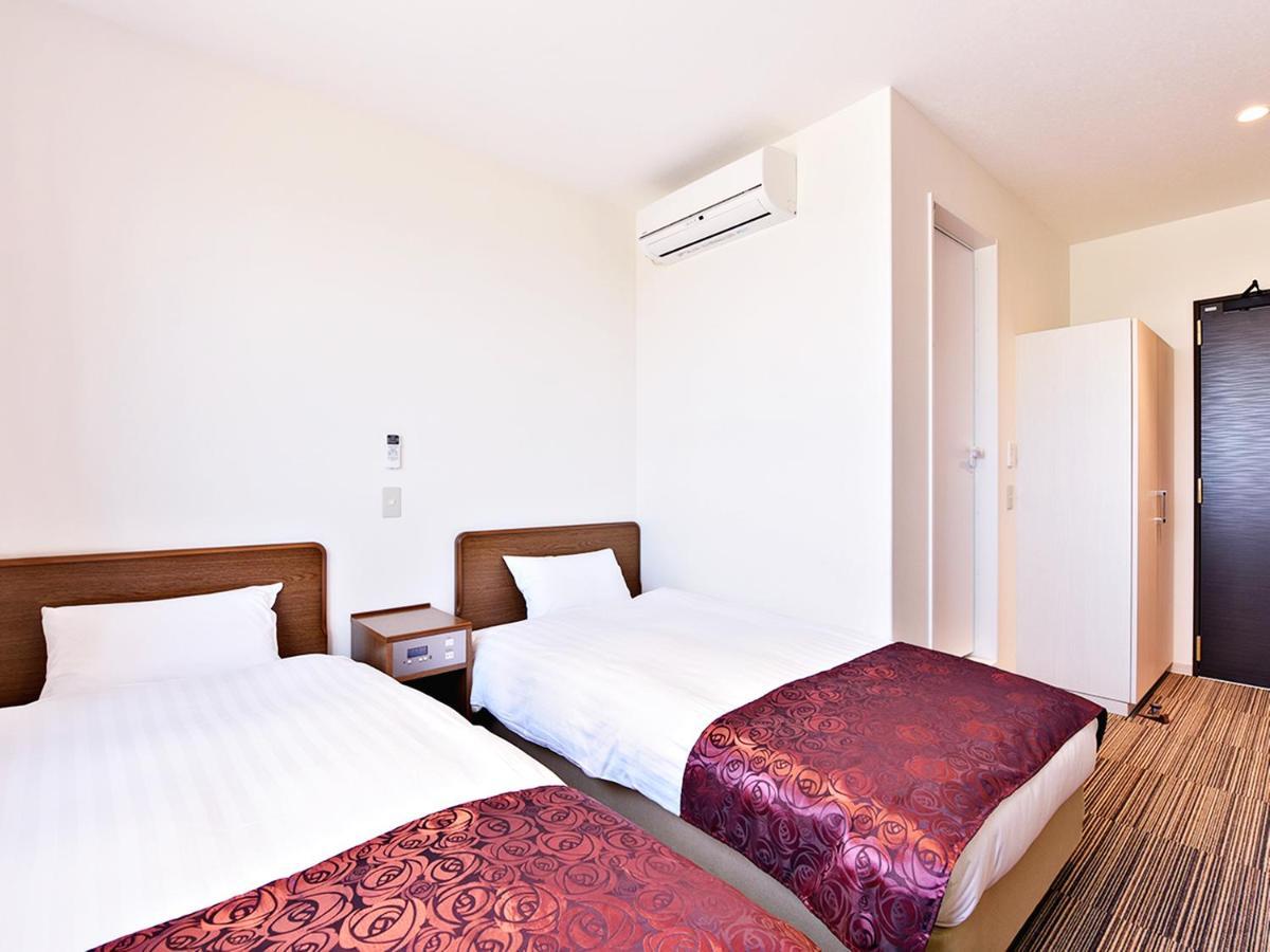 Uchinadamachi Cycling Terminal Hotel Bagian luar foto
